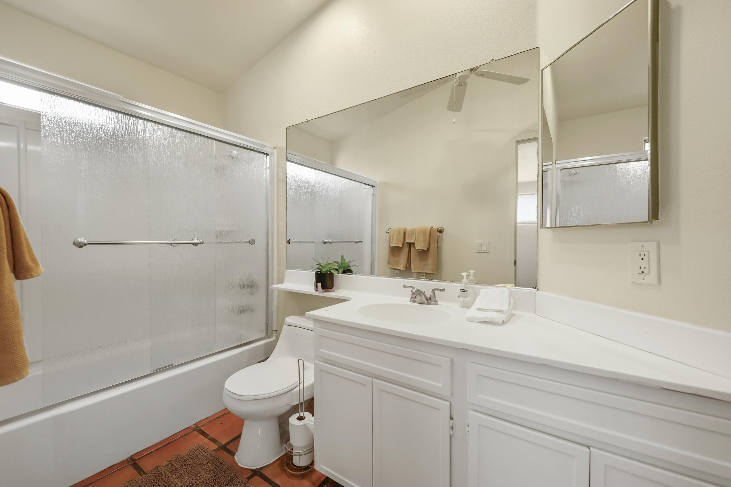 80380 Paseo Encanto Indio, CA 92201 - Photo 26 of 32 a bathroom with a sink a toilet and shower