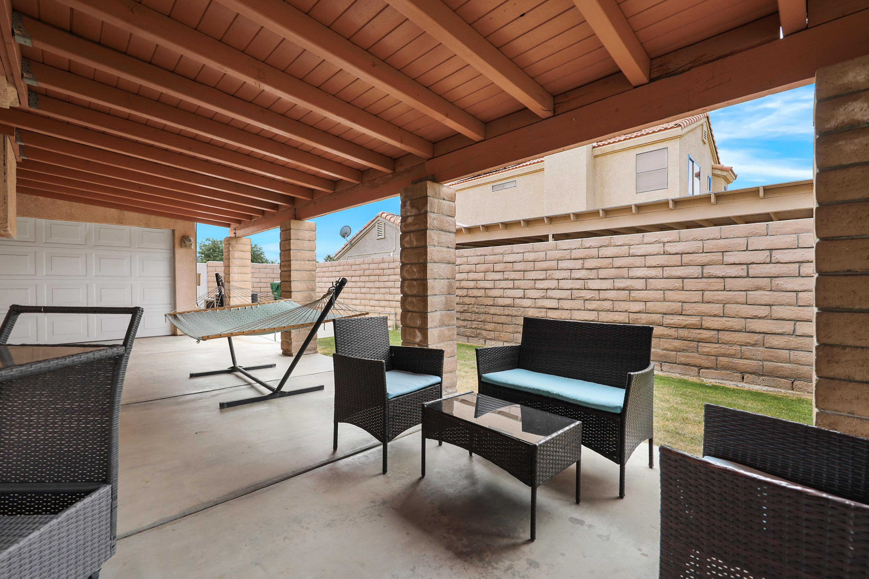 80380 Paseo Encanto Indio, CA 92201 - Photo 29 of 32 a building outdoor space with patio furniture