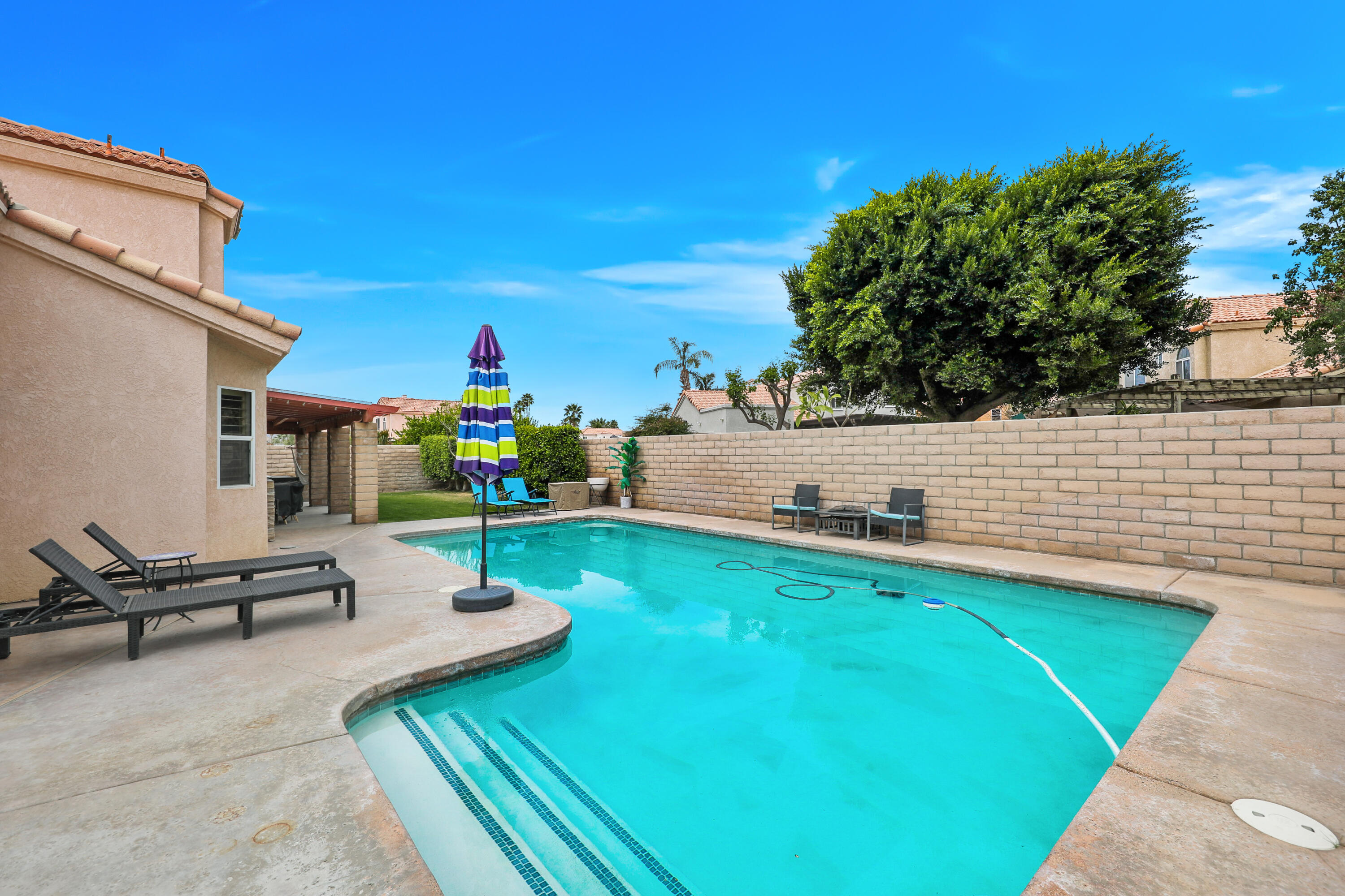 80380 Paseo Encanto Indio, CA 92201 - Photo 31 of 32 a view of a backyard with a patio
