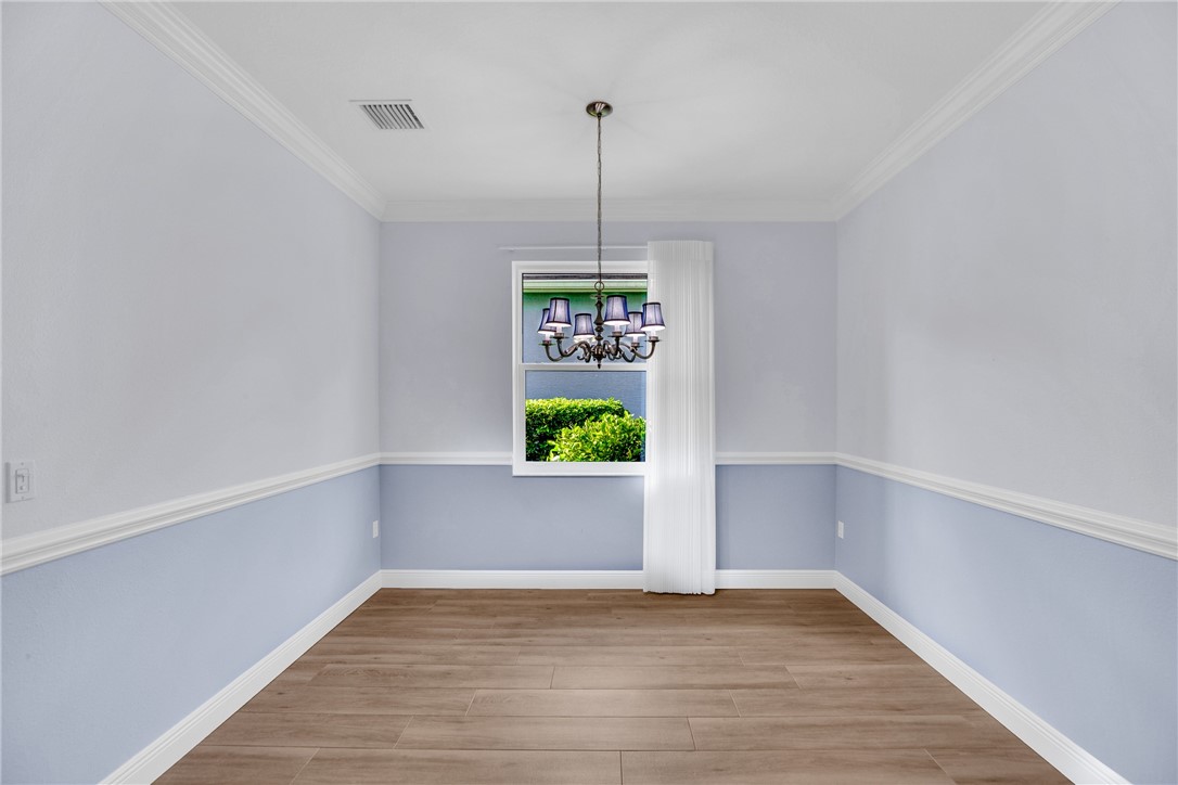 239 11th Square Southwest Vero Beach, FL 32962 - Photo 17 of 36 a view of room with window and entryway