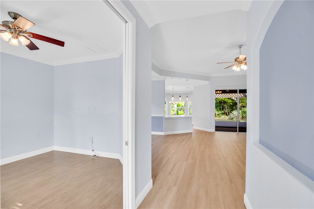 239 11th Square Southwest Vero Beach, FL 32962 - Photo 7 of 36 wooden floor in an empty room