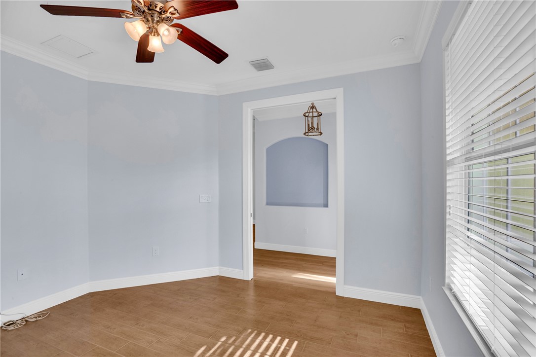 239 11th Square Southwest Vero Beach, FL 32962 - Photo 9 of 36 a view of an empty room and window
