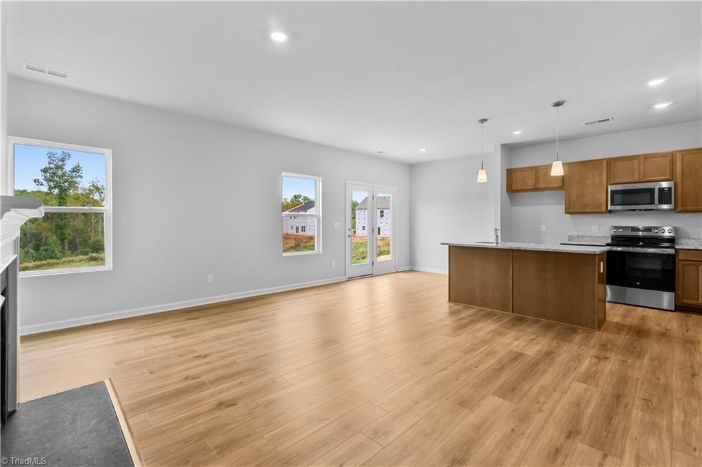 5097 Fallmeade Road Kernersville, NC 27284 - Photo 8 of 41 Open Family Room to Kitchen