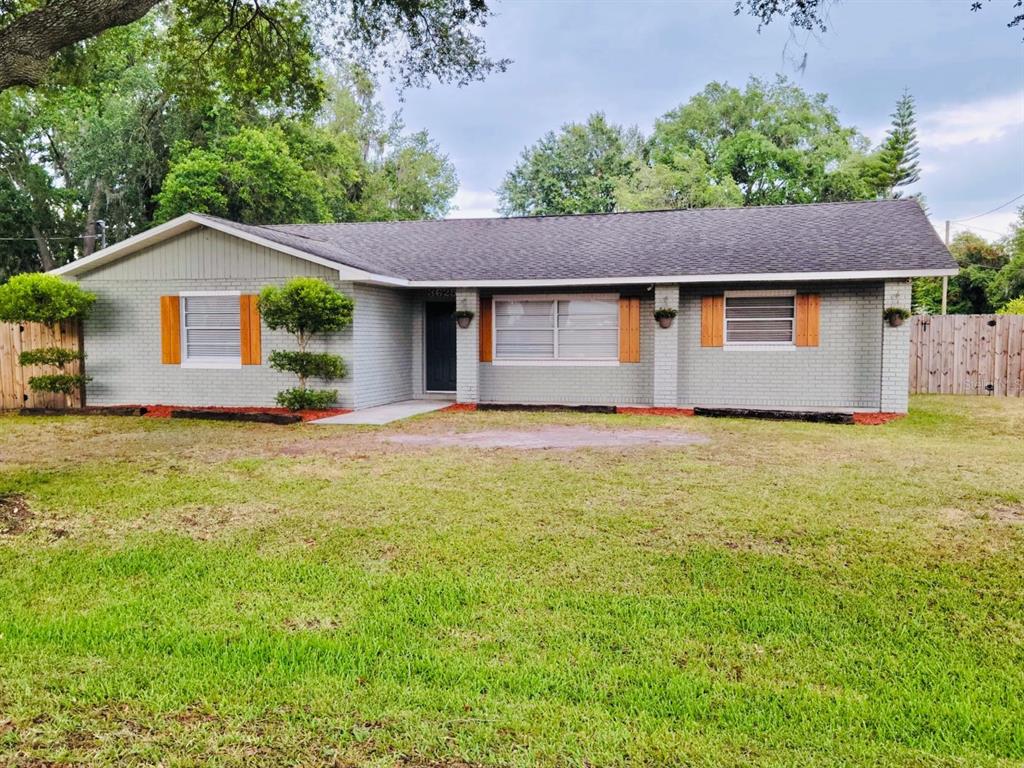 front view of a house with a yard