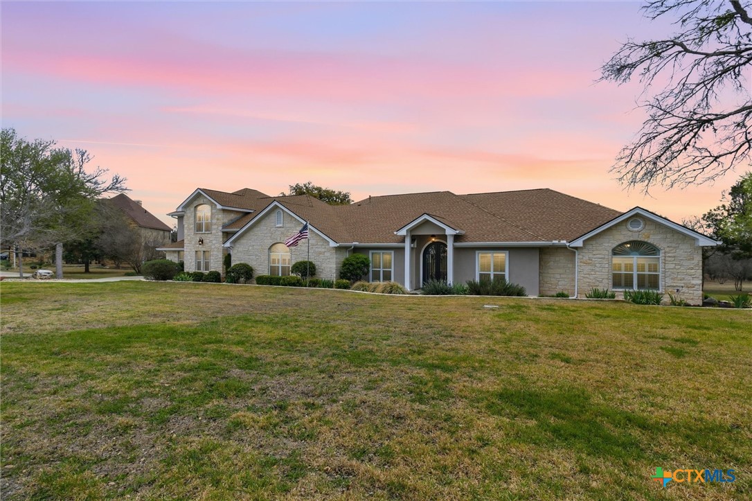 2235 Summit Ridge San Marcos, TX 78666 - Photo 2 of 38 a front view of a house with a yard