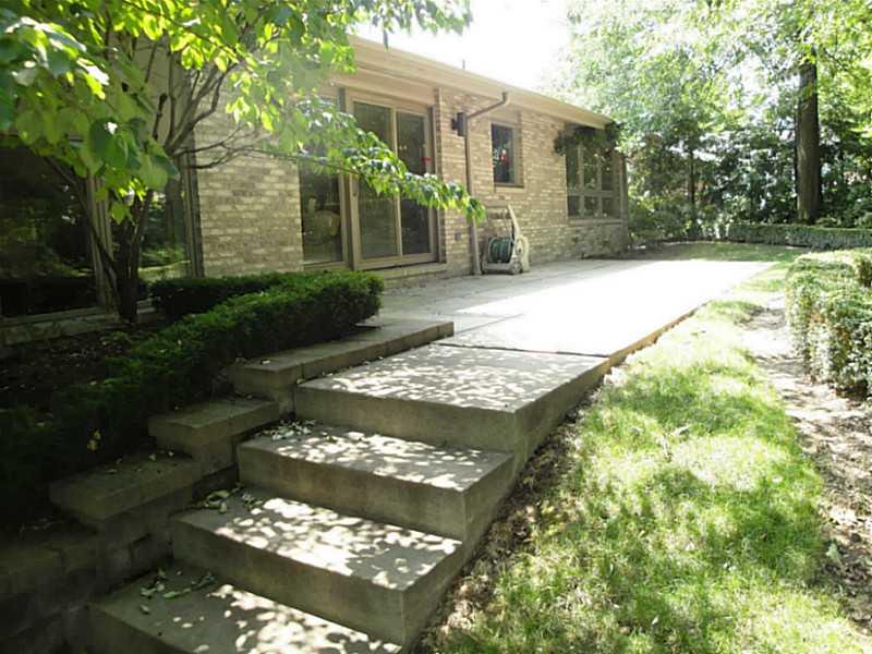 4 Elmhurst Road Green Tree, PA 15220 - Photo 23 of 25 Patio/Deck. The patio off the kitchen is shown here. Stairs lead to another patio off the family room.
