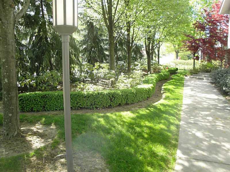 4 Elmhurst Road Green Tree, PA 15220 - Photo 24 of 25 Land/Lot. Professional landscaping surrounding the walkway to the front entry provides privacy, while the sprinkler system minimizes maintenance.