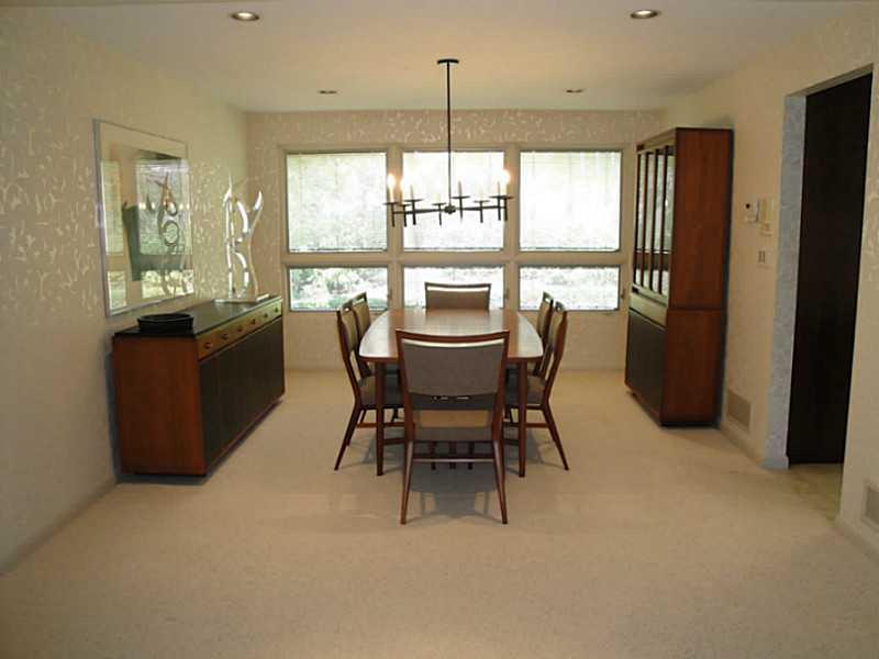 4 Elmhurst Road Green Tree, PA 15220 - Photo 8 of 25 Dining Room. The dining room measures 12x14 and overlooks the rear of the lot. This photo was taken from the living room. To the right is the entry to the kitchen.