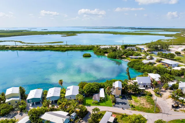 a view of a city with an ocean view