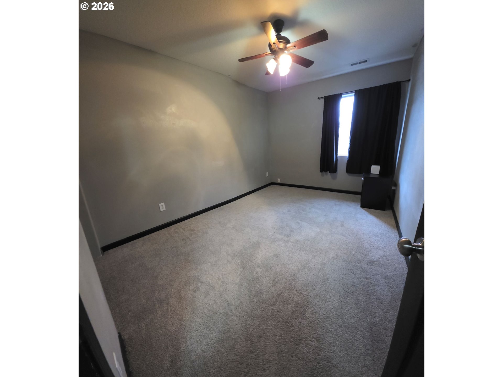 2703 Southwest 11th Street Battle Ground, WA 98604 - Photo 15 of 16 a view of an empty room with a window