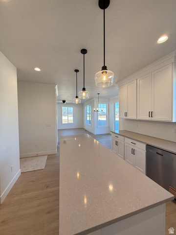 1142 West 220 North Mapleton, UT 84664 - Photo 5 of 26 Kitchen with white cabinets, dishwasher, light stone counters, and light wood-style flooring