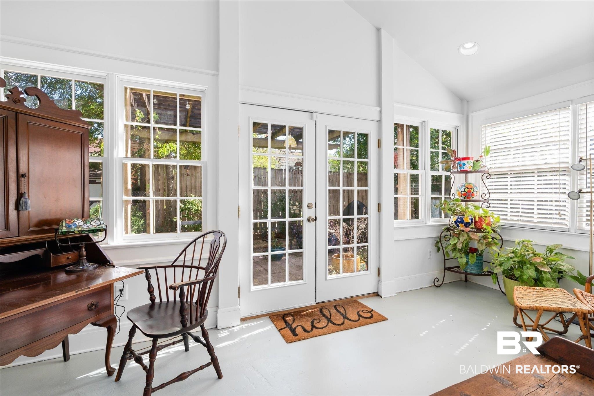 202 Woodlands Avenue Mobile, AL 36607 - Photo 16 of 53 Sunroom with lofted ceiling, french doors, and a healthy amount of sunlight