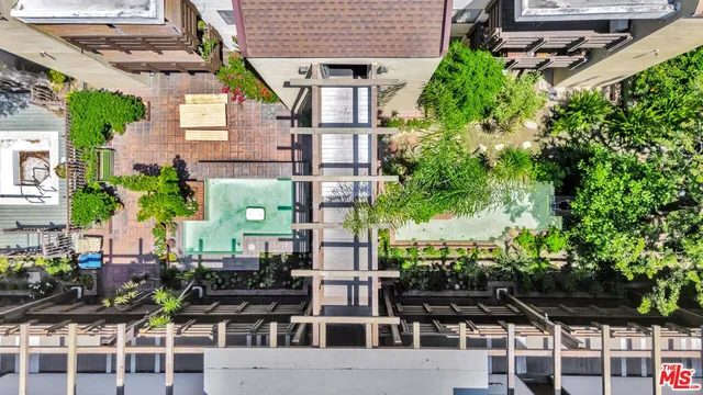 a view of a garden with a pathway