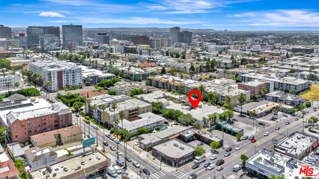 a view of a pathway both side of the house