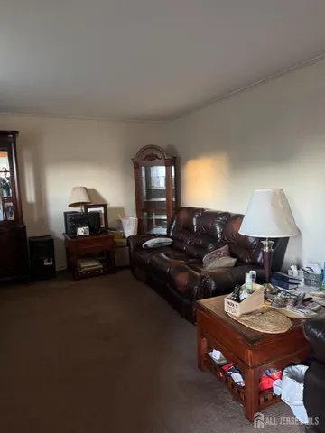 a kitchen with appliances a sink and cabinets