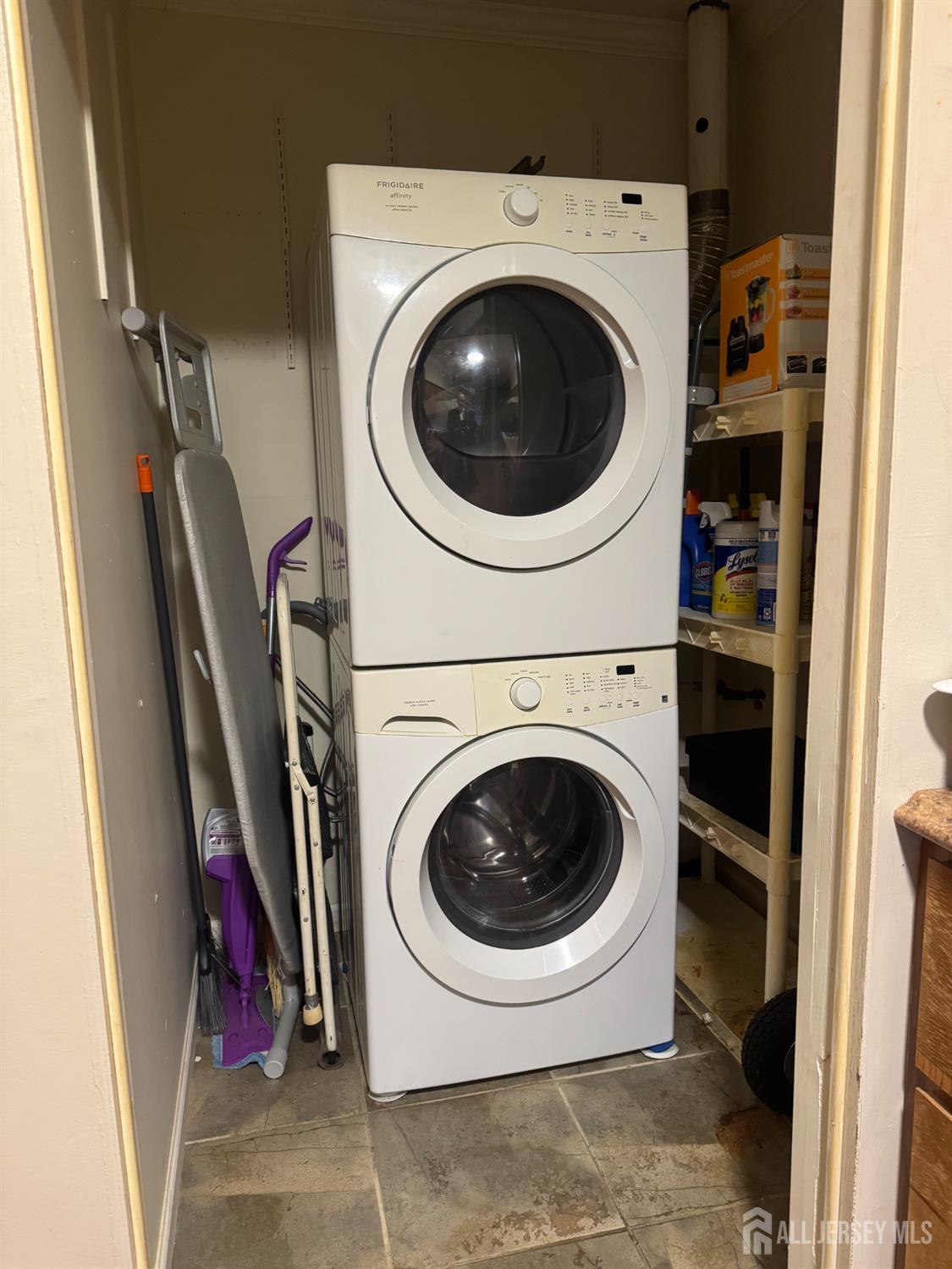 9 Valery Road Old Bridge, NJ 07747 - Photo 6 of 7 a utility room with dryer and washer