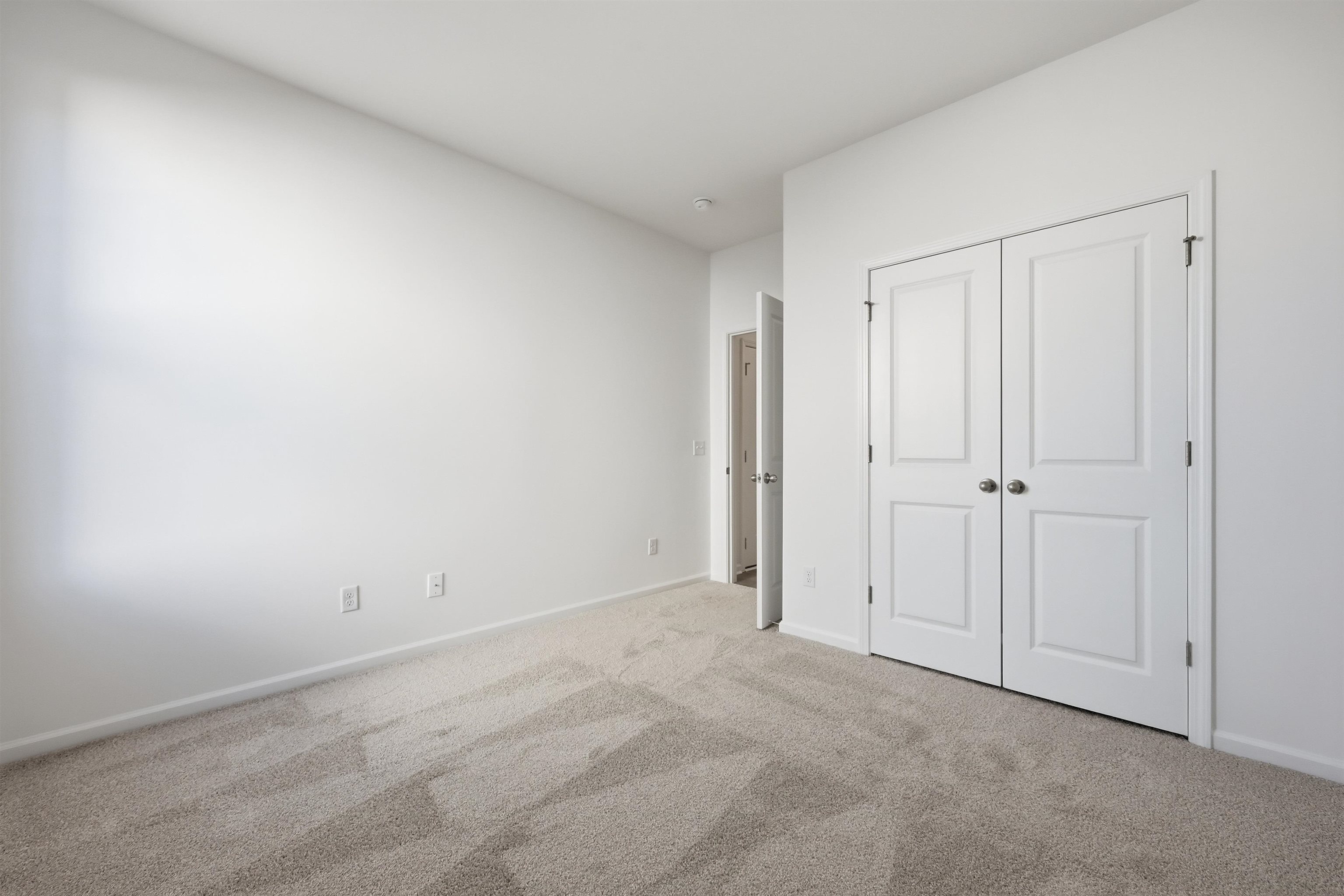 145 River Birch Drive Loris, SC 29569 - Photo 16 of 36 Unfurnished bedroom with carpet floors and a closet