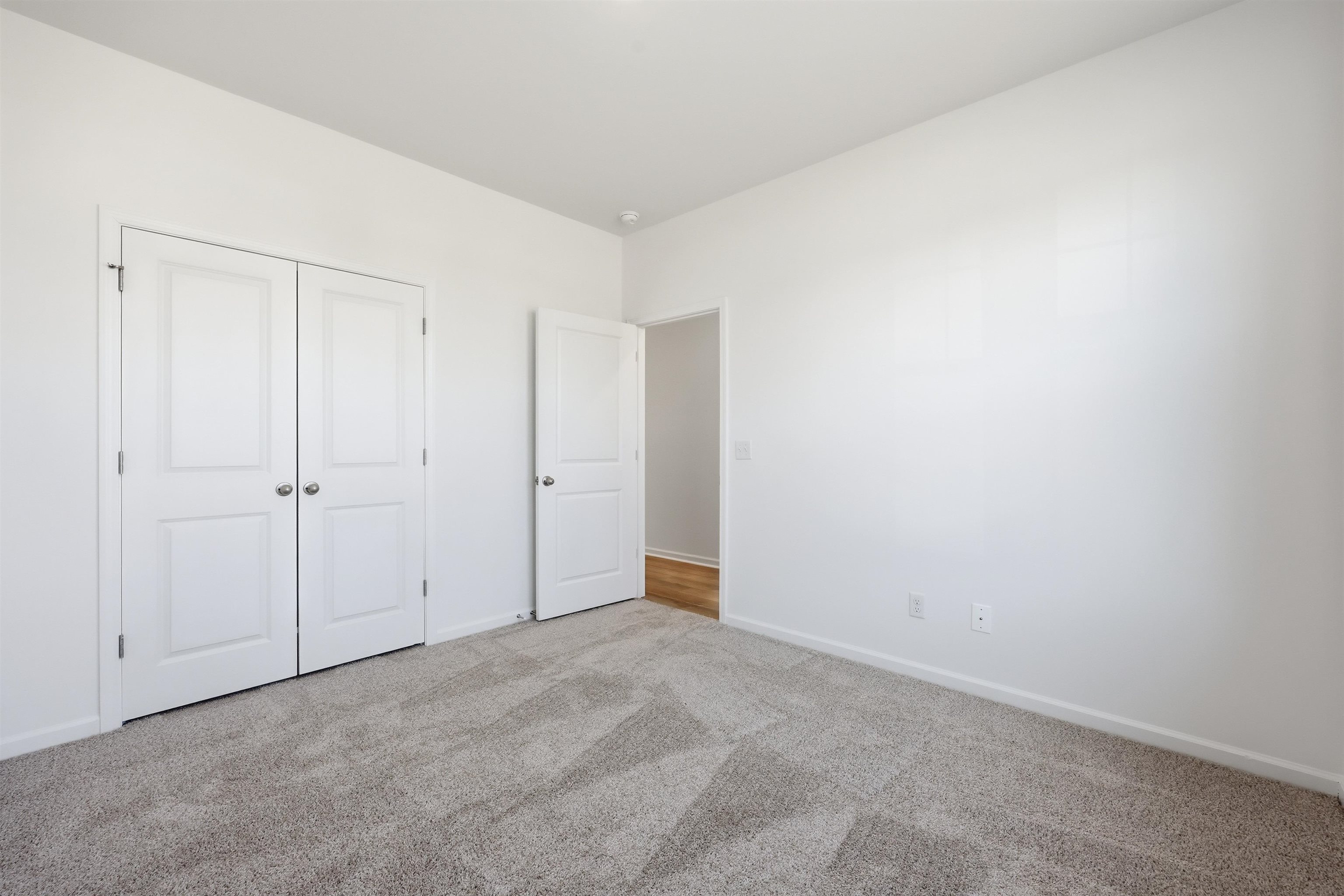 145 River Birch Drive Loris, SC 29569 - Photo 17 of 36 Unfurnished bedroom featuring carpet flooring and a closet