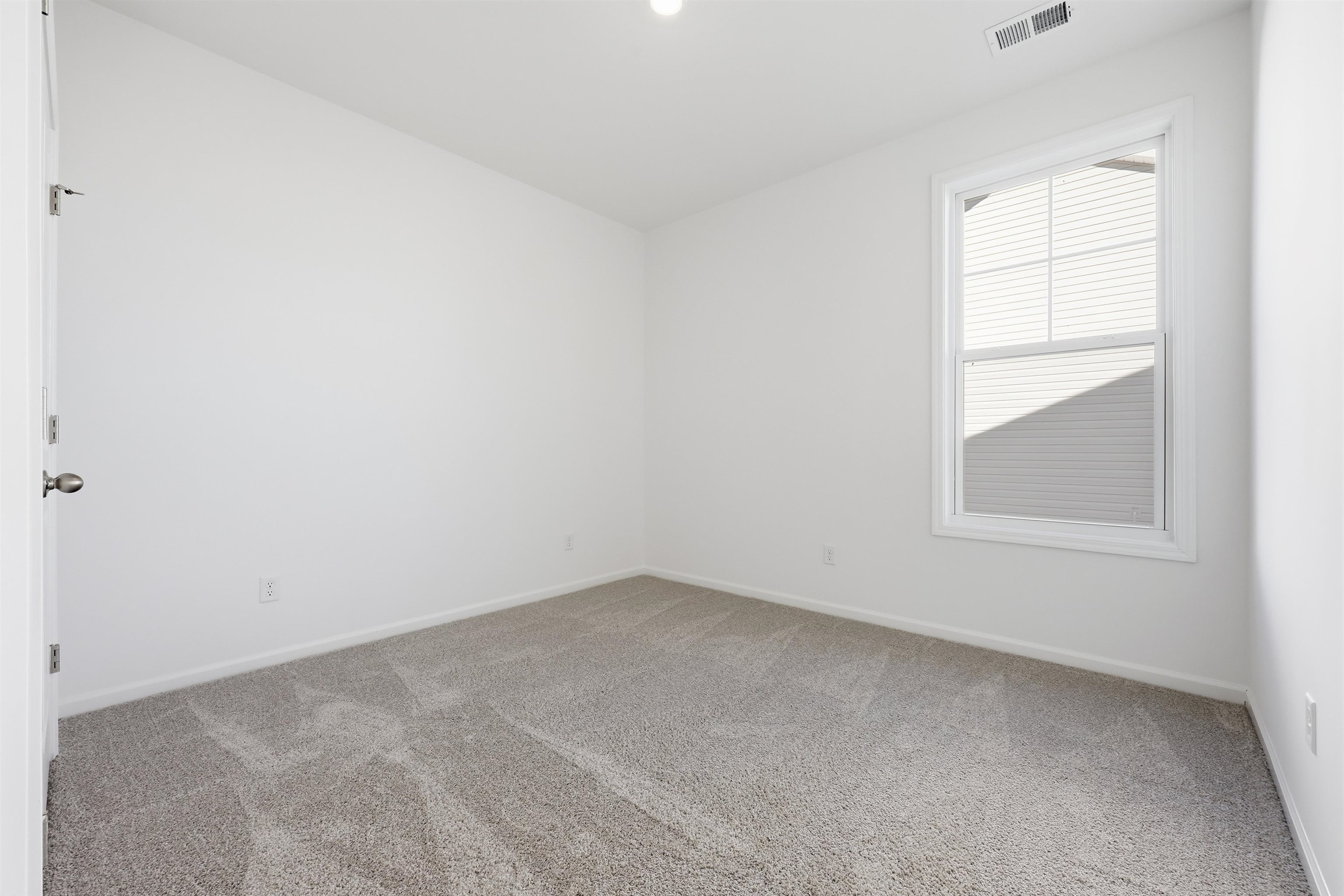 145 River Birch Drive Loris, SC 29569 - Photo 18 of 36 Carpeted spare room featuring baseboards