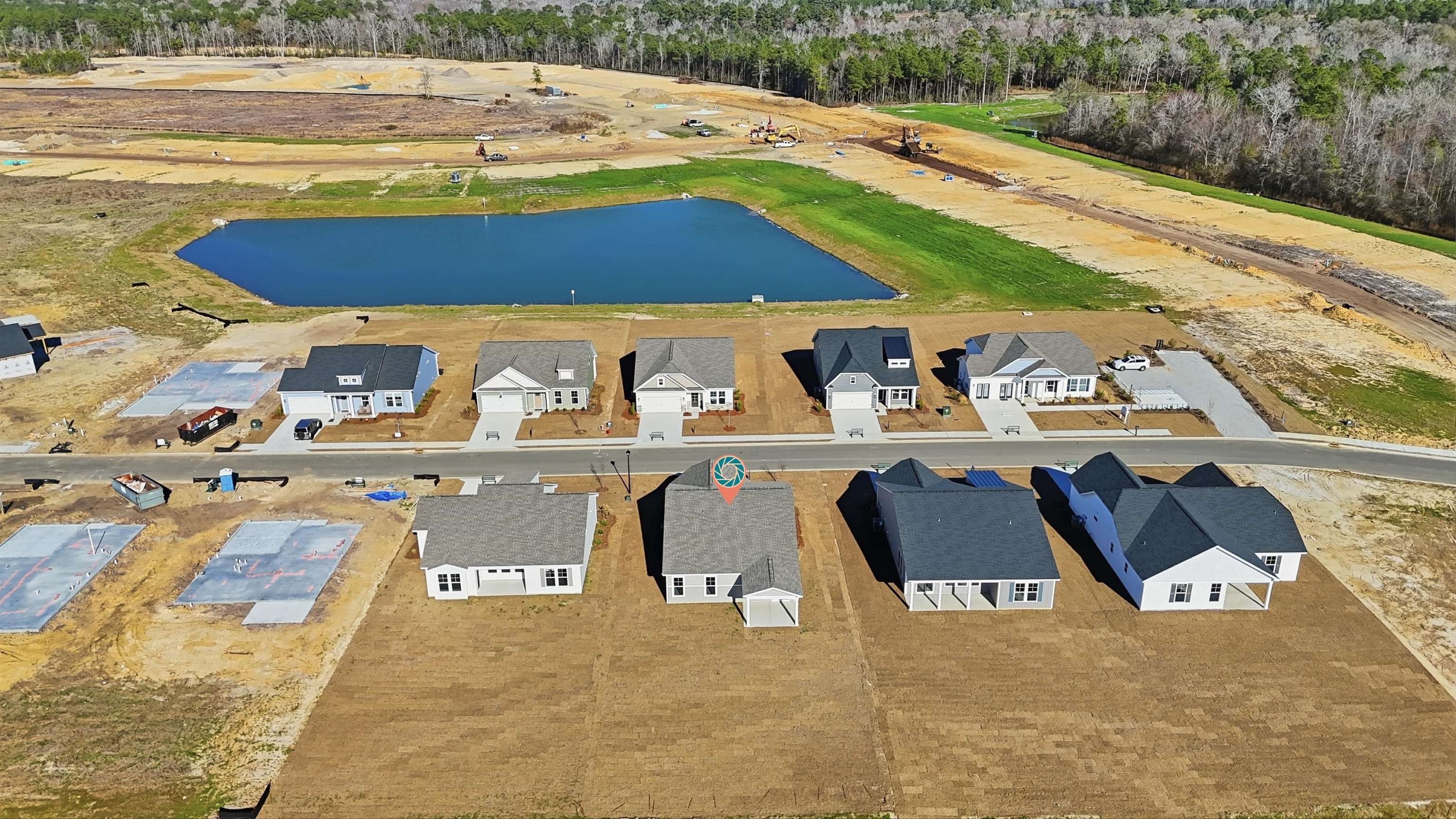 145 River Birch Drive Loris, SC 29569 - Photo 19 of 36 Aerial view of residential area with a nearby body of water