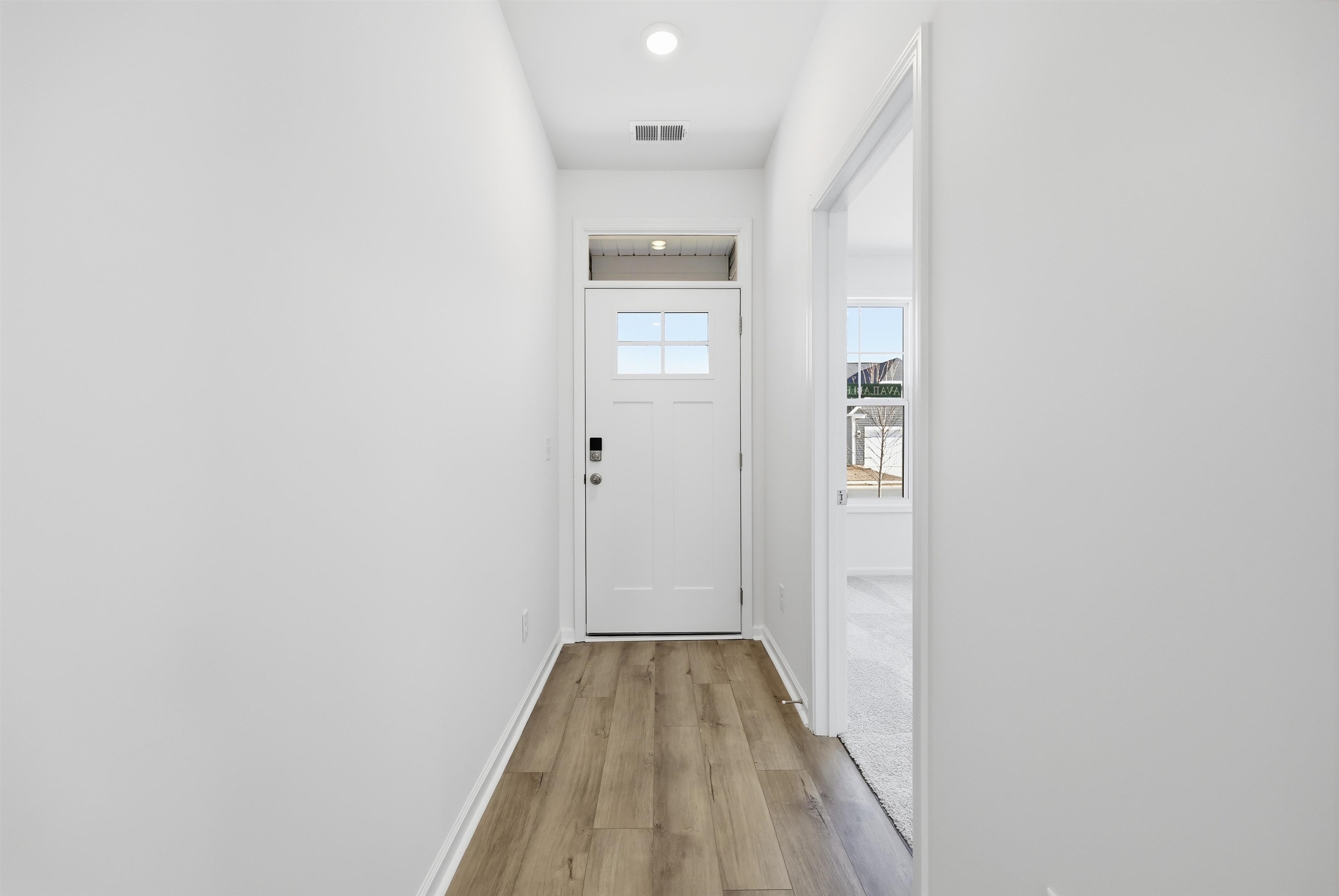145 River Birch Drive Loris, SC 29569 - Photo 3 of 36 Entryway with wood finished floors and recessed lighting