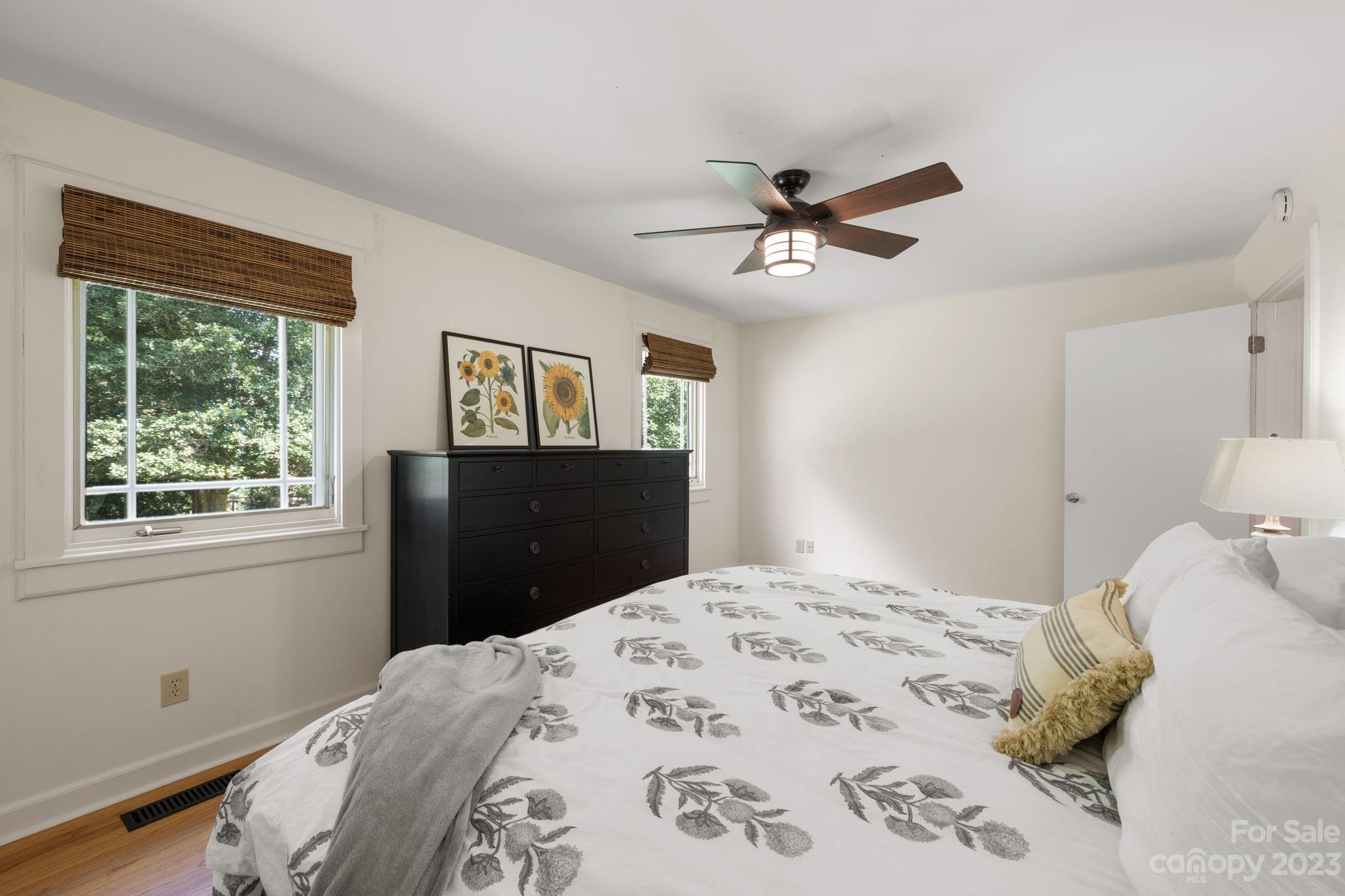 244 Mimosa Road Tryon, NC 28782 - Photo 29 of 47 a bedroom with a bed dresser and a window