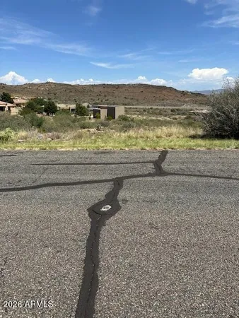 a view of an ocean and mountain