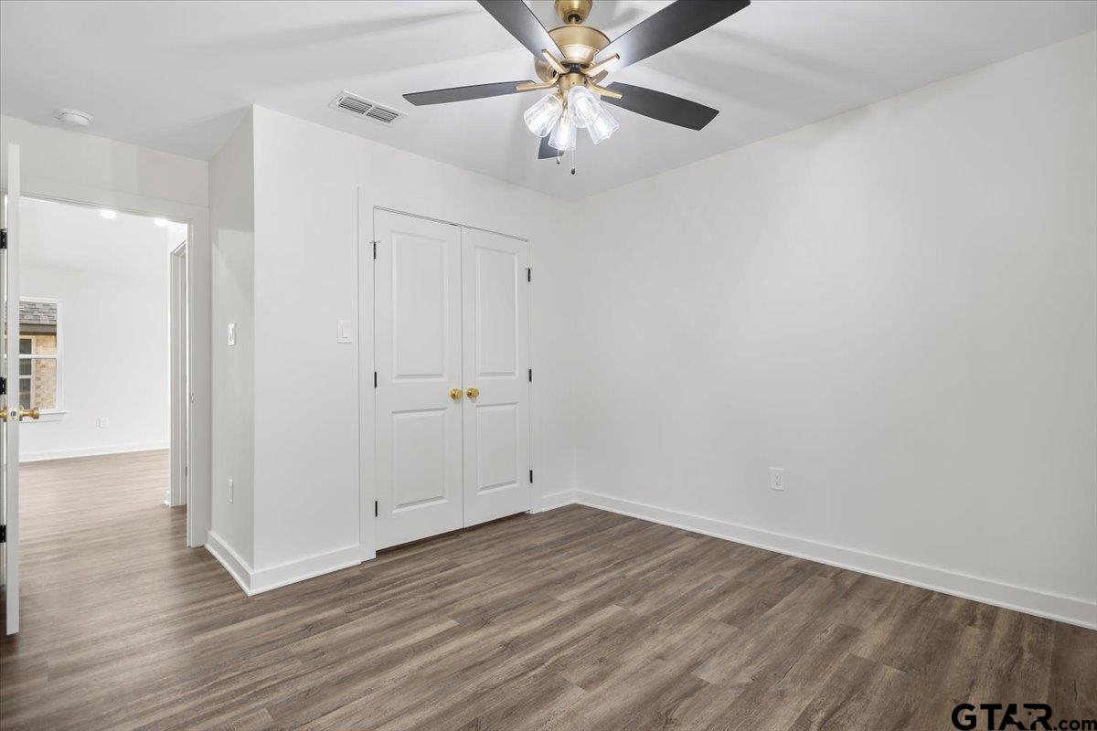 435 West Harmony Street Tyler, TX 75702 - Photo 15 of 22 wooden floor in an empty room