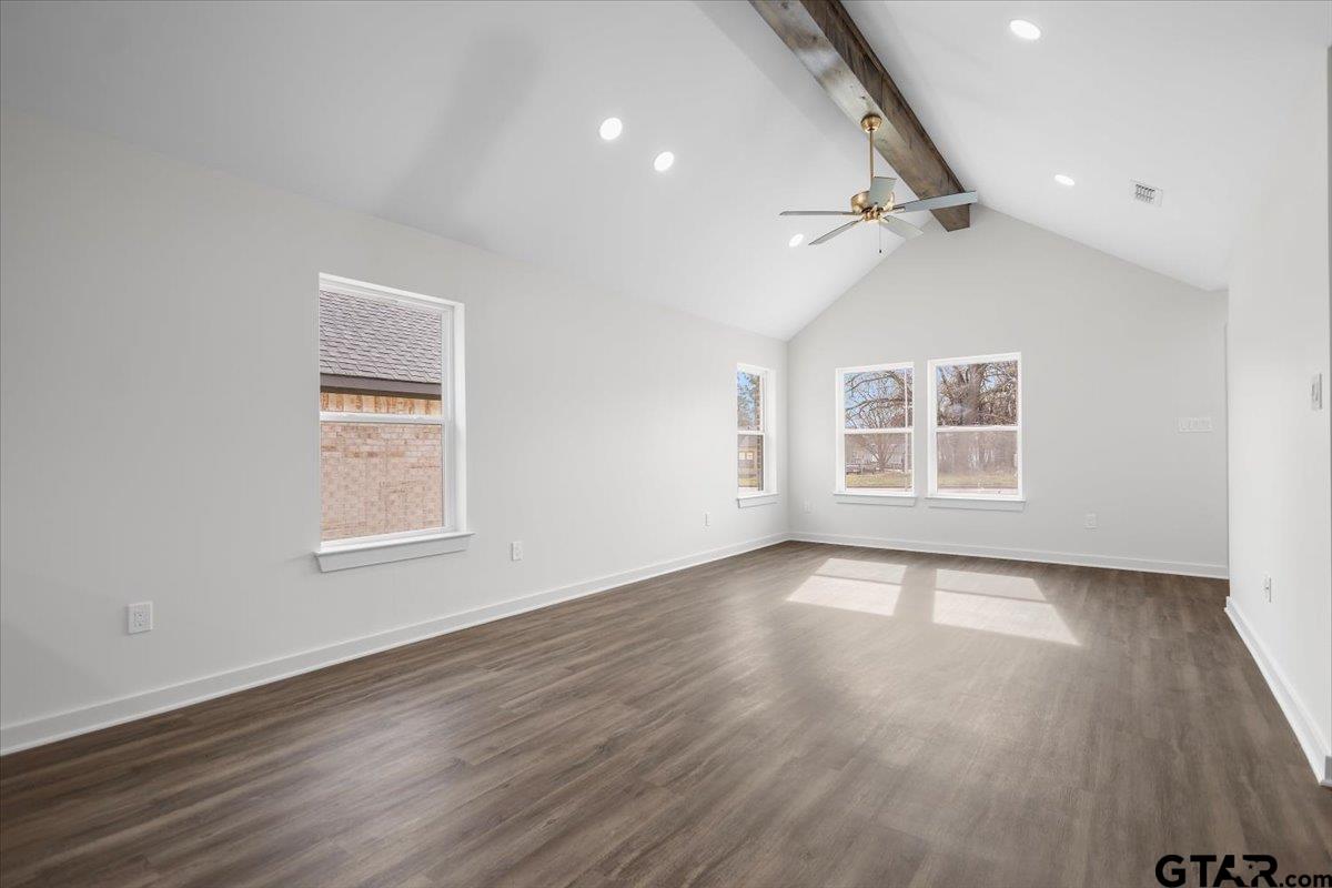 435 West Harmony Street Tyler, TX 75702 - Photo 6 of 22 wooden floor in an empty room with a window