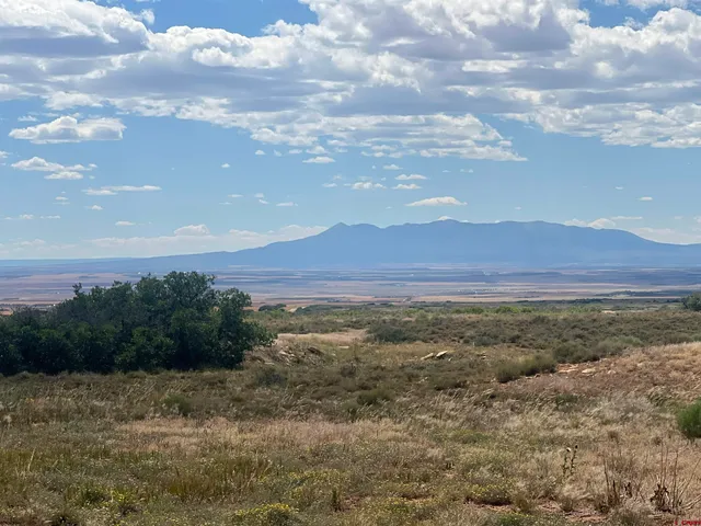 a view of an outdoor space and mountain view in back
