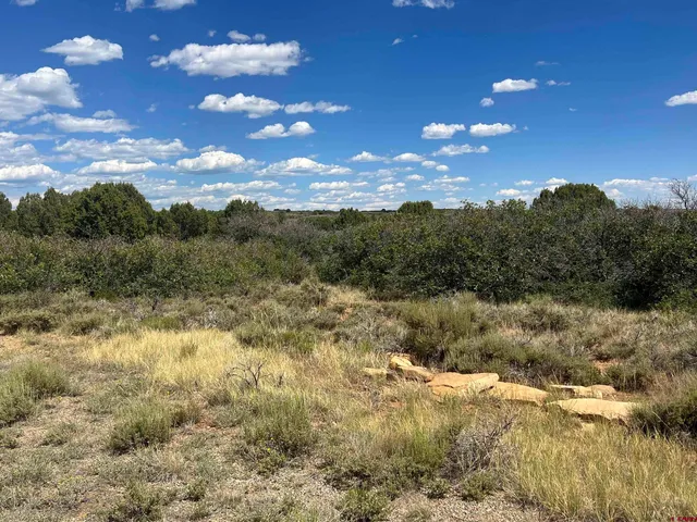 a view of an outdoor space and mountain view in back