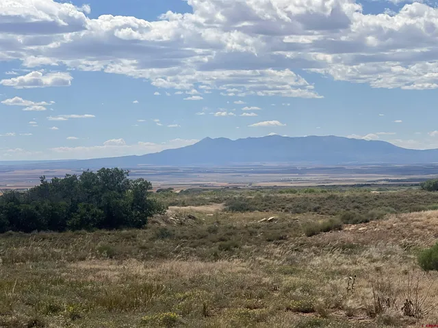 a view of an outdoor space and mountain view in back