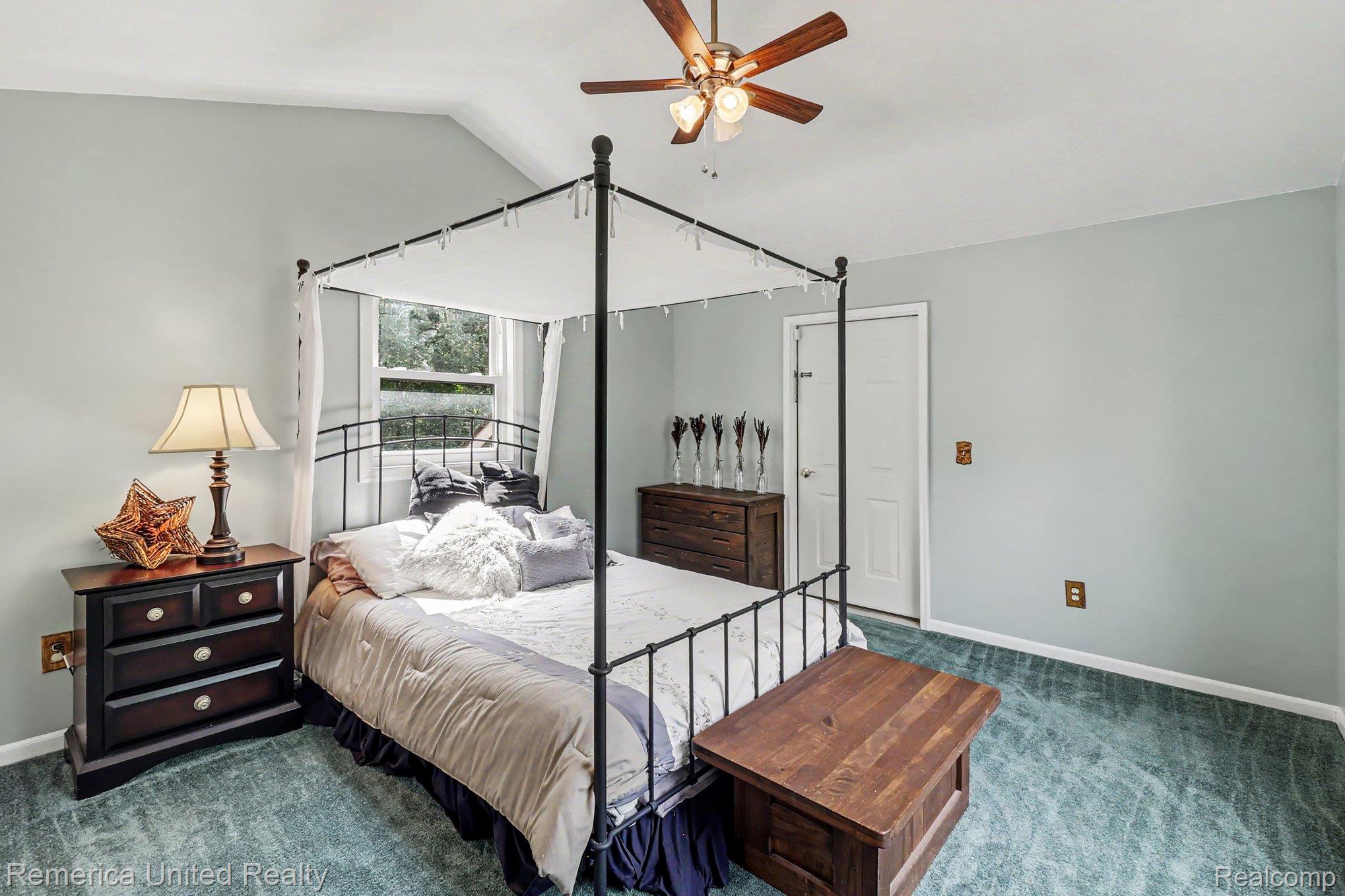 20962 Wasson Road Gregory, MI 48137 - Photo 20 of 39 Bedroom featuring a vaulted ceiling and a ceiling fan