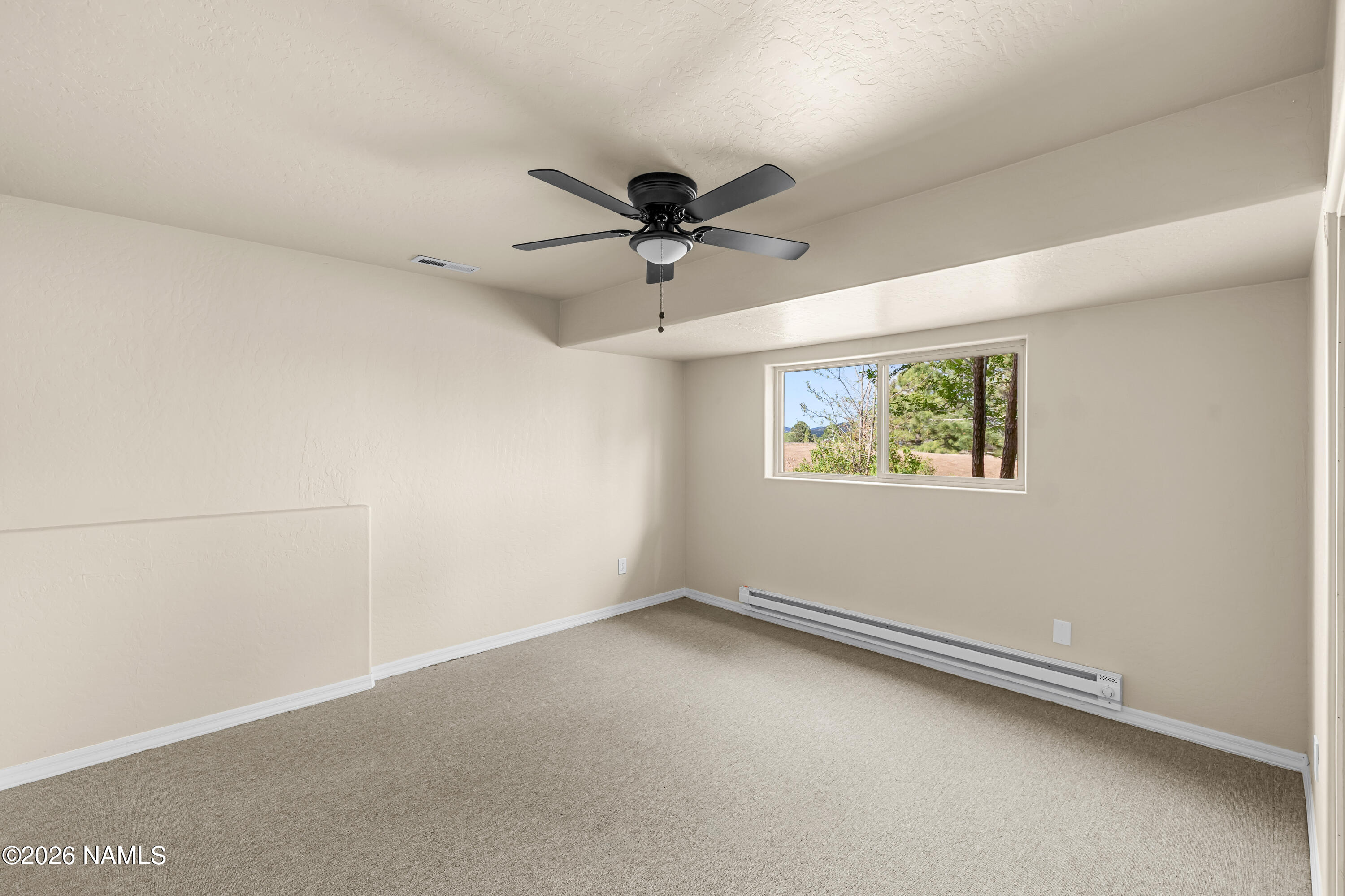 8205 North Reata Road Flagstaff, AZ 86004 - Photo 23 of 45 Bedroom 3 downstairs