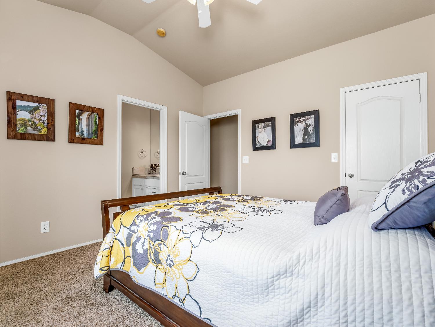 12 Breeze Way Madera, CA 93637 - Photo 35 of 48 a bedroom with a bed and a cabinets