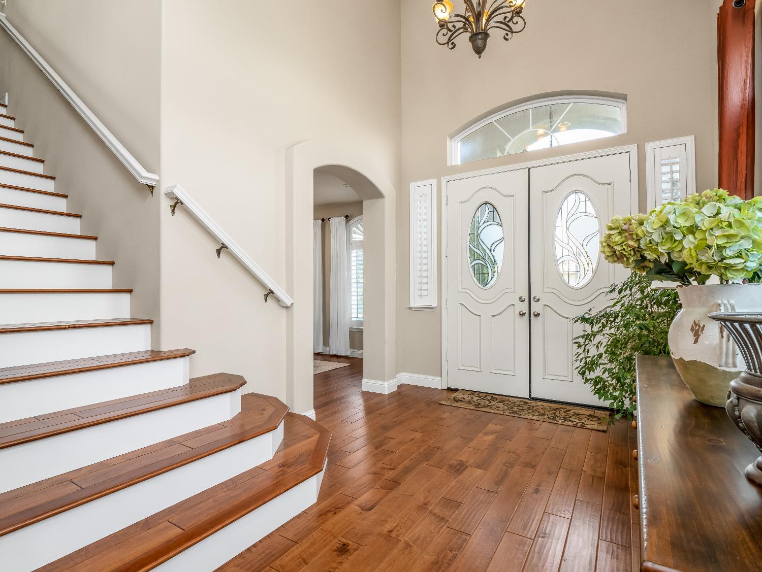 12 Breeze Way Madera, CA 93637 - Photo 5 of 48 a view of a hallway with entryway wooden floor and front door