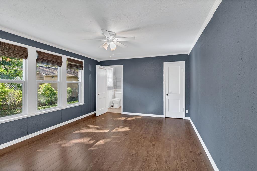 1815 North Riverside Drive Fort Worth, TX 76111 - Photo 20 of 30 Beautiful windows in the primary bedroom.