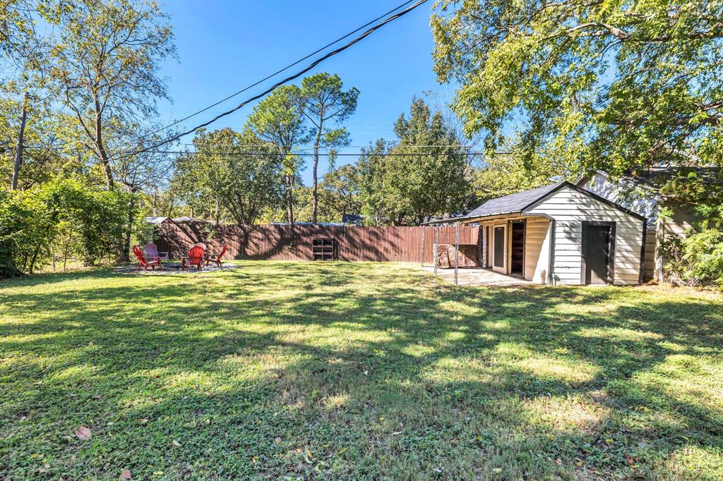1815 North Riverside Drive Fort Worth, TX 76111 - Photo 24 of 30 Great backyard with outbuilding.