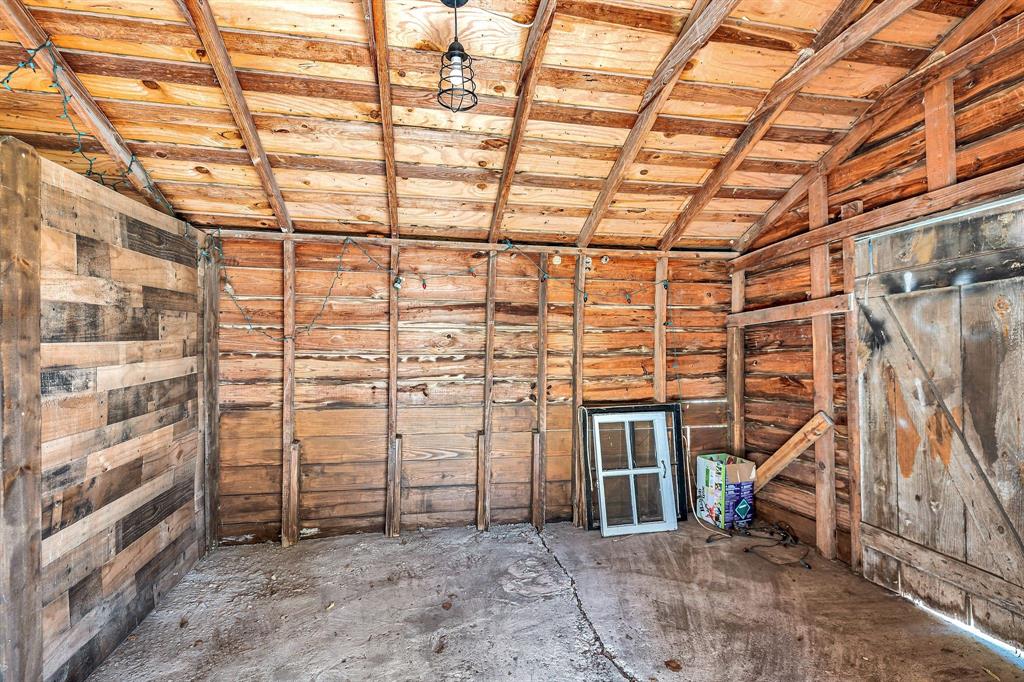 1815 North Riverside Drive Fort Worth, TX 76111 - Photo 28 of 30 Unfinished interior of outbuilding.