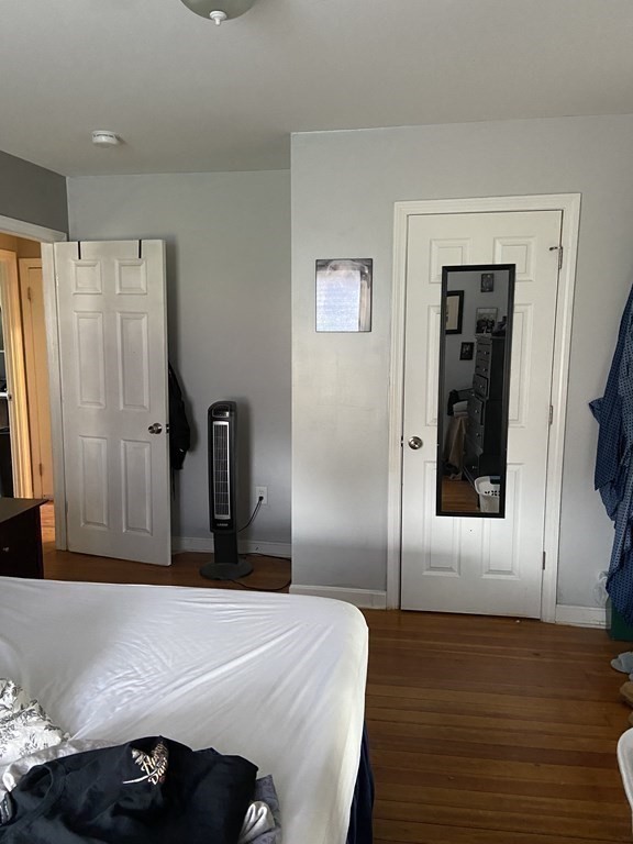 61 Schumacher Road Lancaster, MA 01523 - Photo 11 of 25 a bedroom with a bed and a window