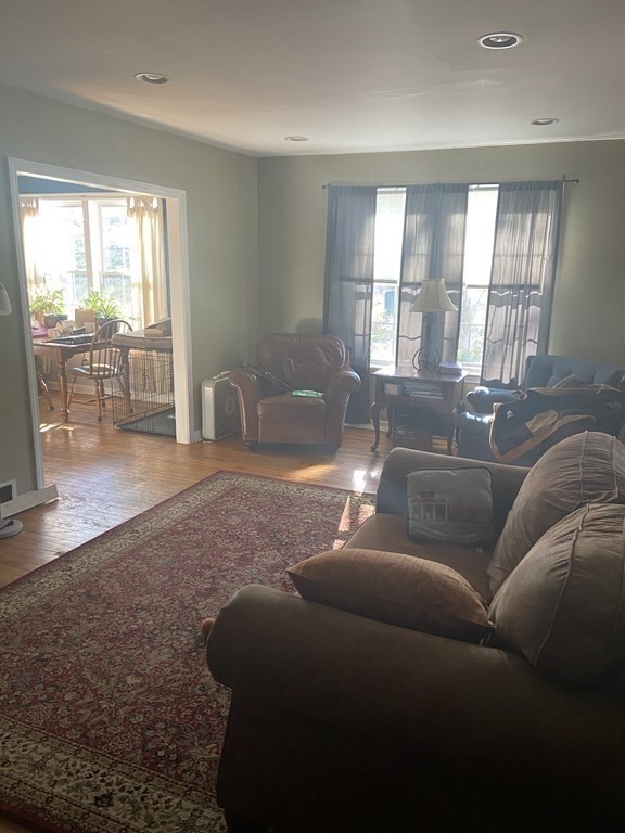 61 Schumacher Road Lancaster, MA 01523 - Photo 4 of 25 a living room with furniture and a large window