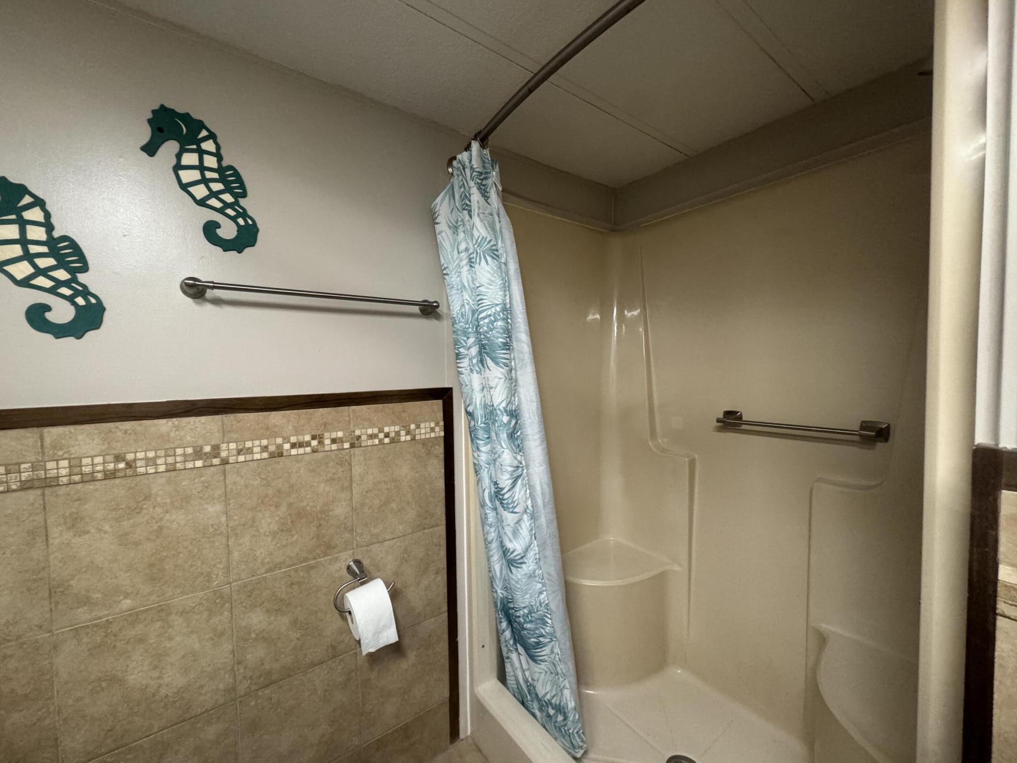 1747 Southwest 35th Circle Okeechobee, FL 34974 - Photo 18 of 21 a bathroom with a shower and toilet