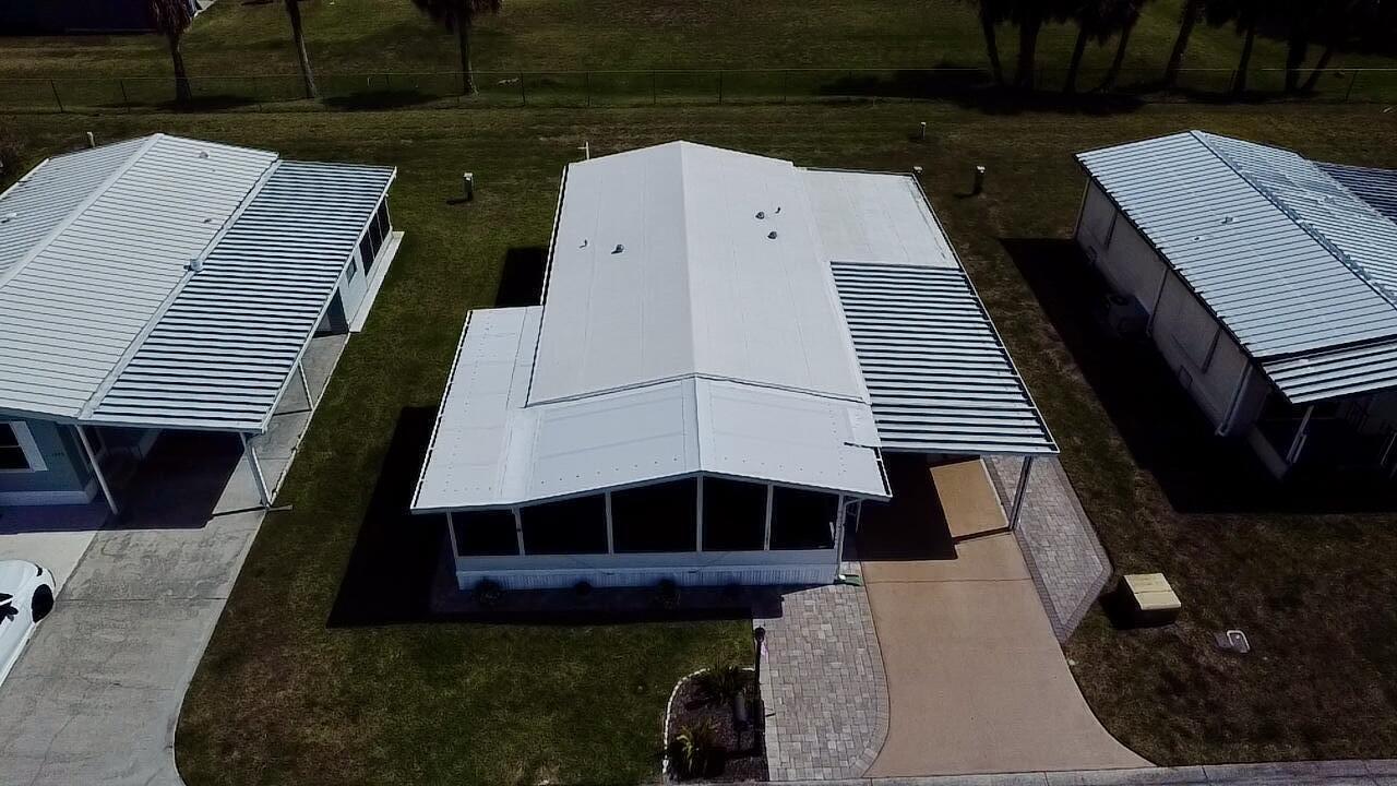 1747 Southwest 35th Circle Okeechobee, FL 34974 - Photo 3 of 21 a view of a balcony with wooden floor