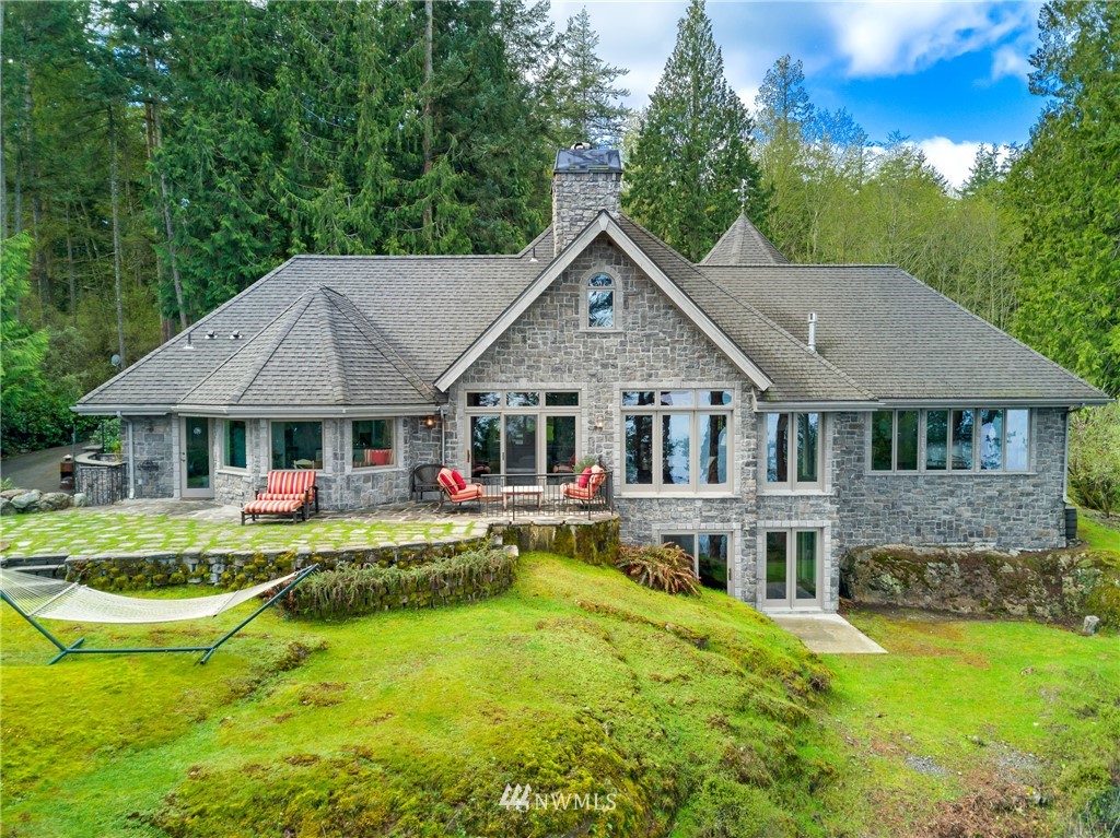 764 Big Foot Road Friday Harbor, WA 98250 - Photo 2 of 34 a view of a house with swimming pool and sitting area