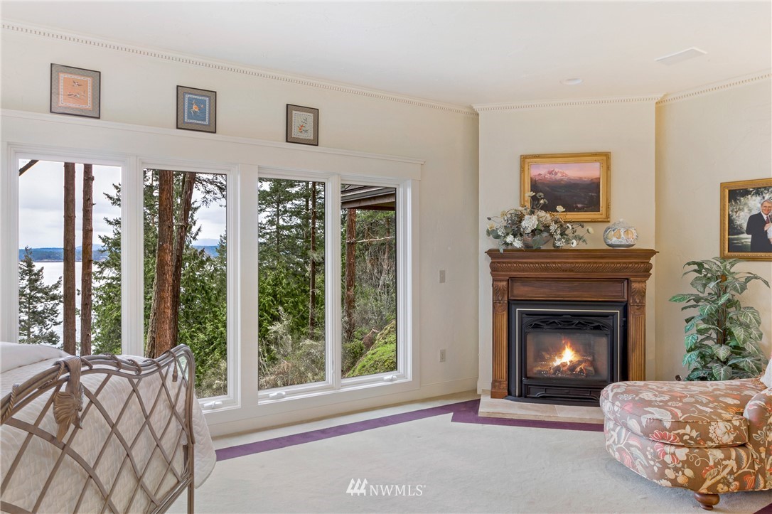 764 Big Foot Road Friday Harbor, WA 98250 - Photo 14 of 34 a living room with furniture and a fireplace