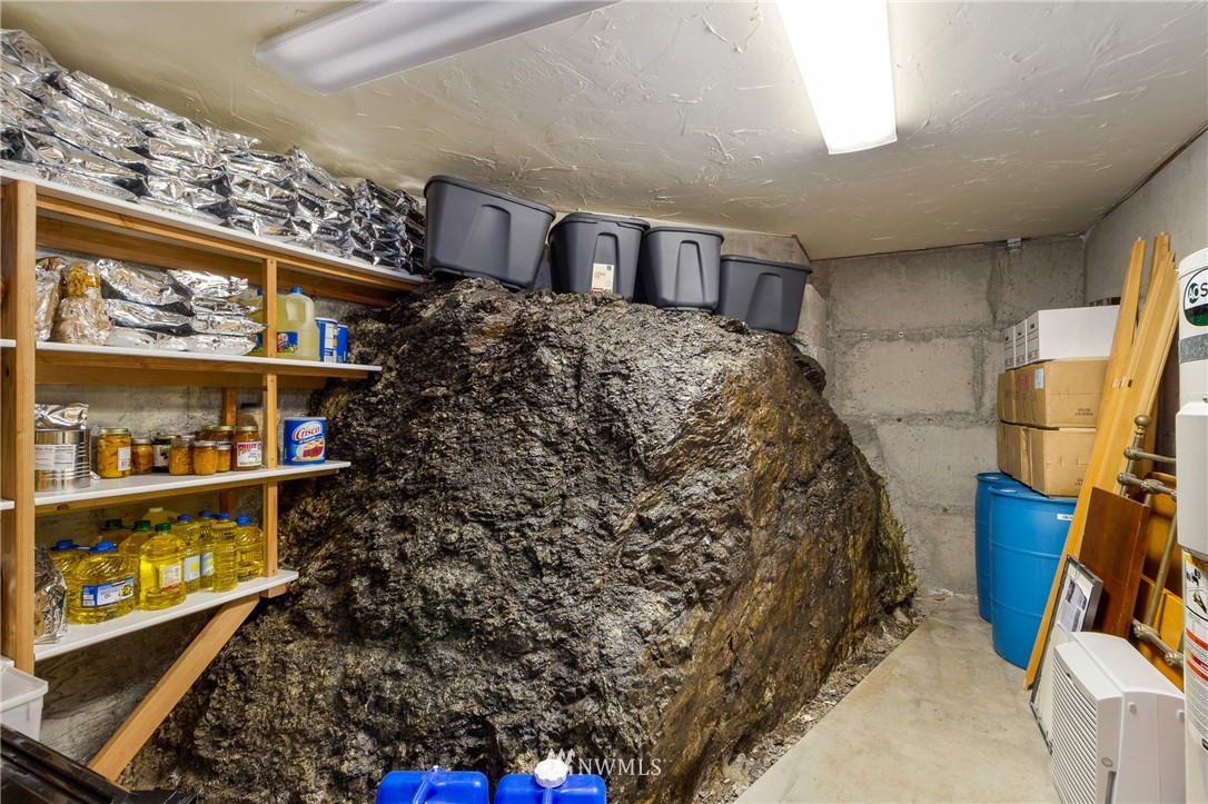 764 Big Foot Road Friday Harbor, WA 98250 - Photo 21 of 34 a bed room with a bed and a window