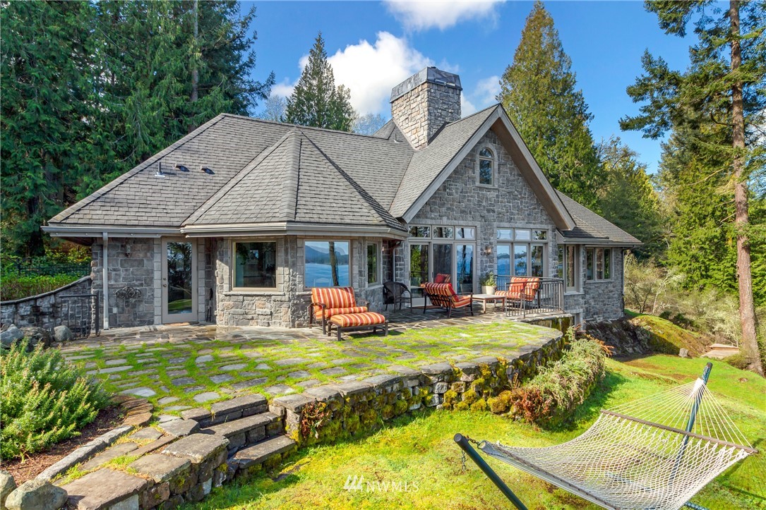 764 Big Foot Road Friday Harbor, WA 98250 - Photo 22 of 34 a view of a house with backyard and sitting area