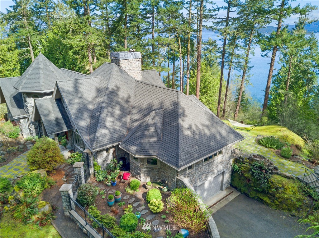 764 Big Foot Road Friday Harbor, WA 98250 - Photo 25 of 34 a aerial view of a house with large trees