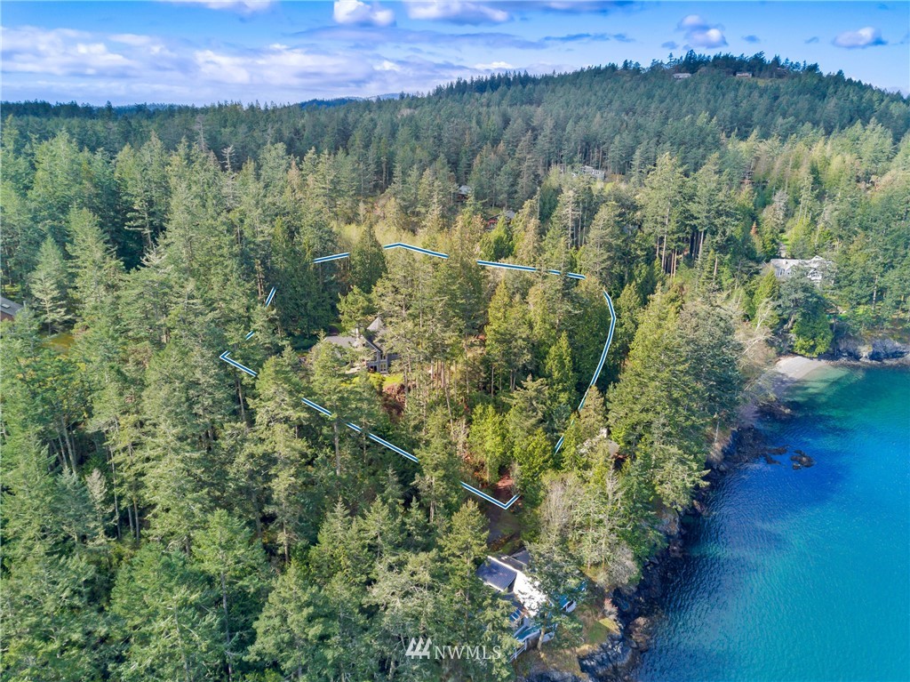 764 Big Foot Road Friday Harbor, WA 98250 - Photo 30 of 34 a view of a lake with a mountain in the background