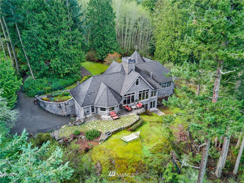 764 Big Foot Road Friday Harbor, WA 98250 - Photo 33 of 34 an aerial view of a house with swimming pool and big yard